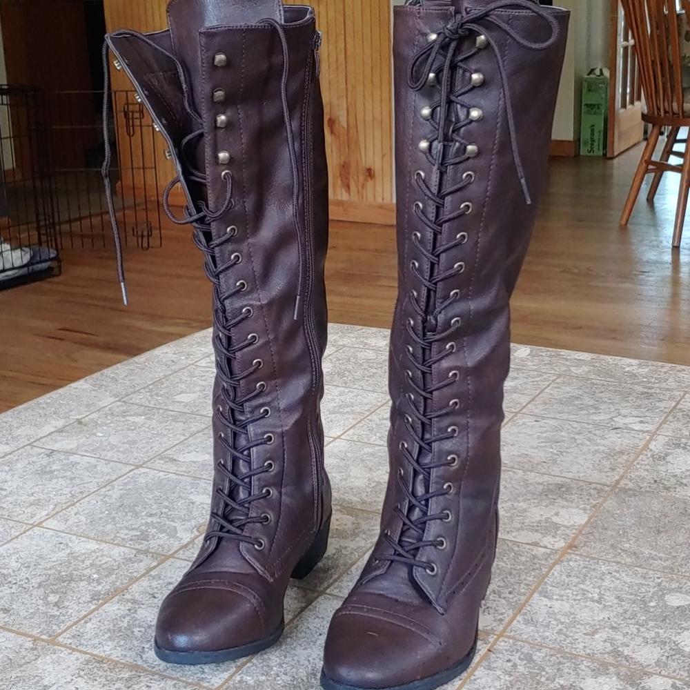Tall brown lace-up boots